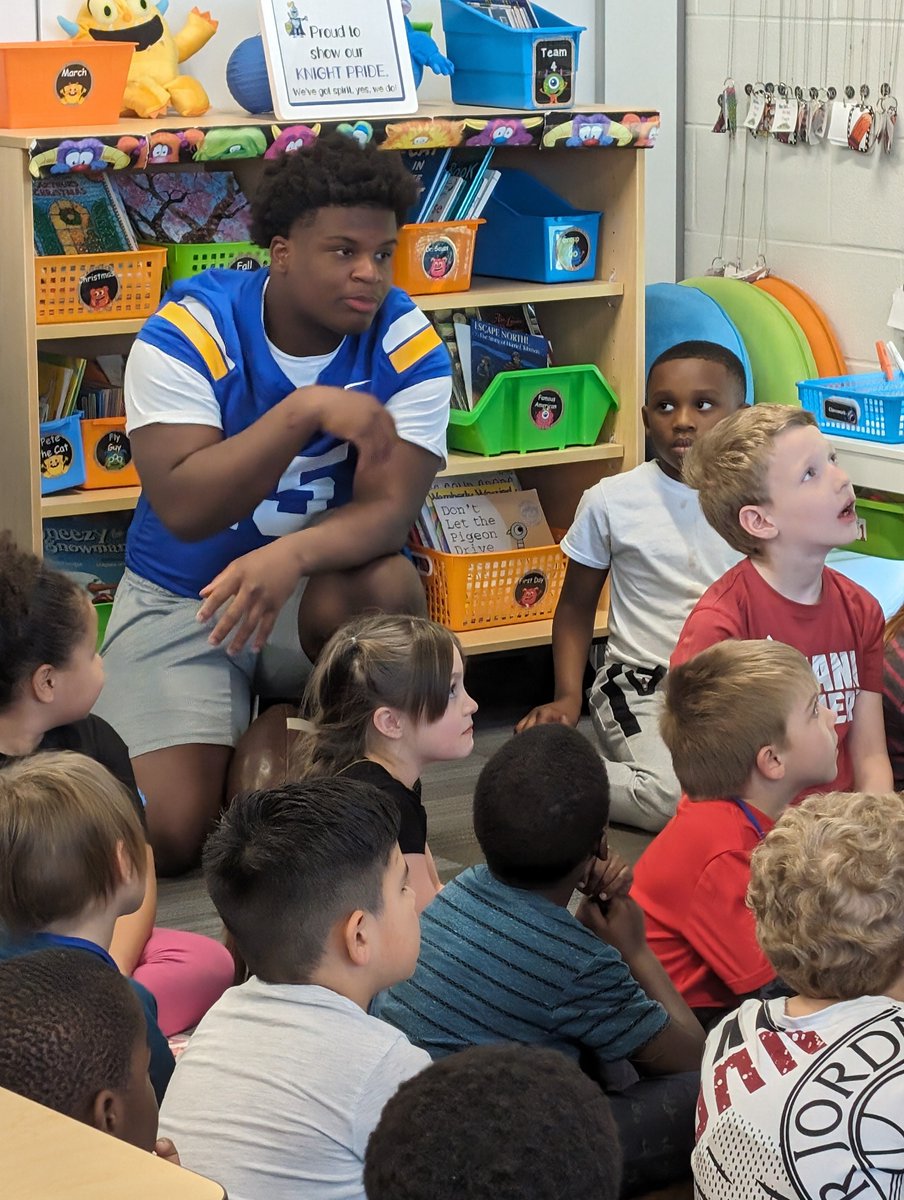 PREPRIDE's tweet image. First-grade students really enjoyed their Mystery Readers!  Some Northwest High School football players read some books to the students.