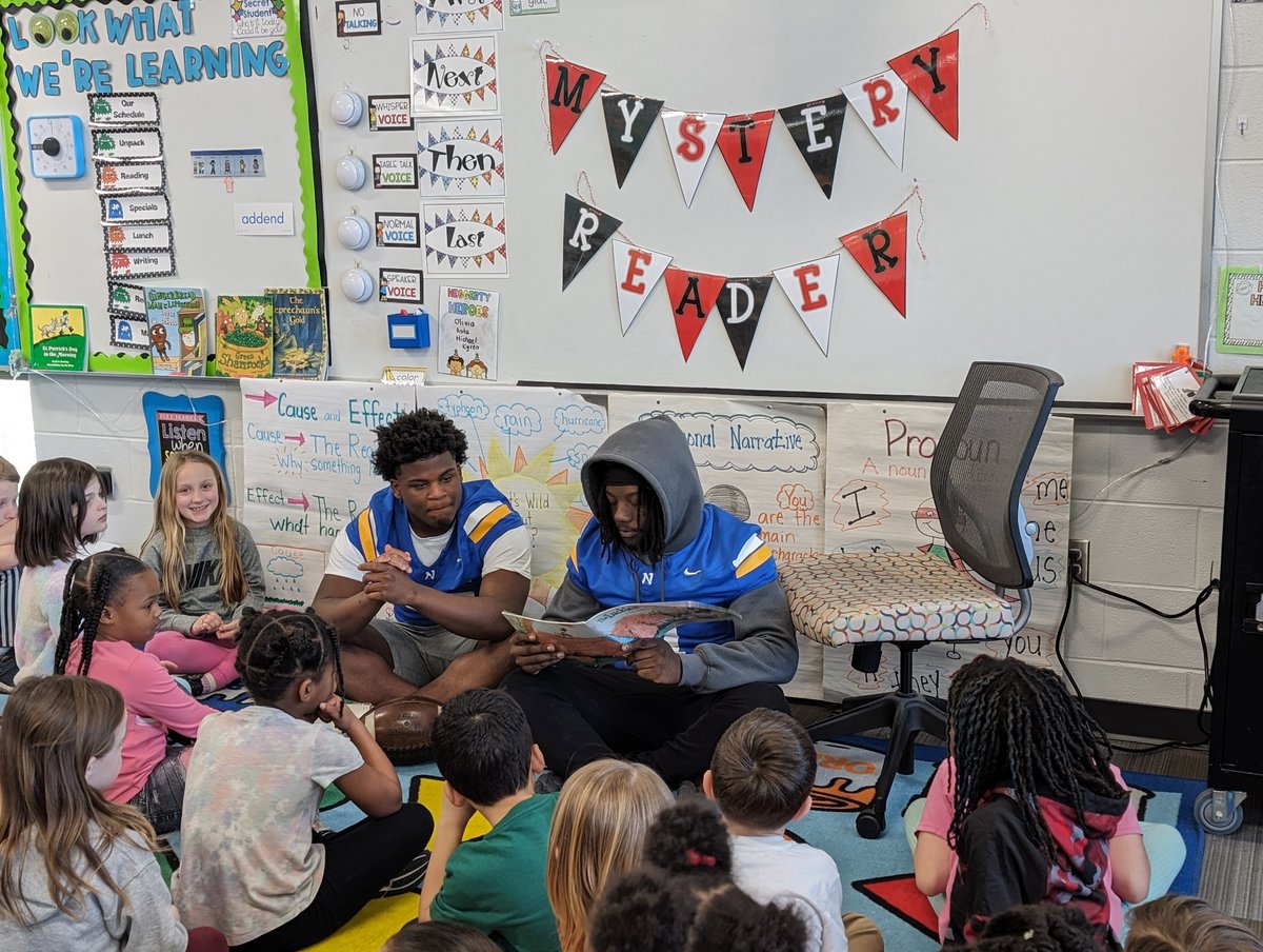 PREPRIDE's tweet image. First-grade students really enjoyed their Mystery Readers!  Some Northwest High School football players read some books to the students.