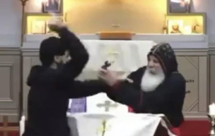 Very powerful still from the video of the attack on Bishop Mari in Australia last week.