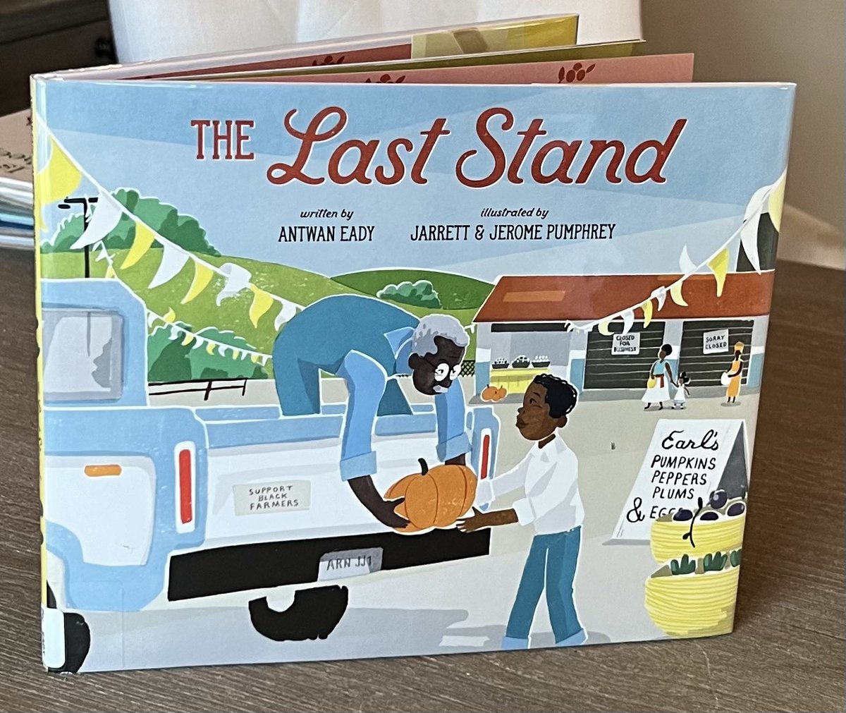 A #picturebook about community, our connection to the land &amp;to each other, &amp; a boy that keeps going. A stand that provides more than peppers, plums, pumpkins &amp; eggs—it grows hope 🫑 🥚 ✨ Poetic &amp; empowering. <a href="/antwan_eady/">Antwan Eady</a> <a href="/wjpumphrey/">Jerome Pumphrey</a> <a href="/jpumphrey/">Jarrett Pumphrey</a>