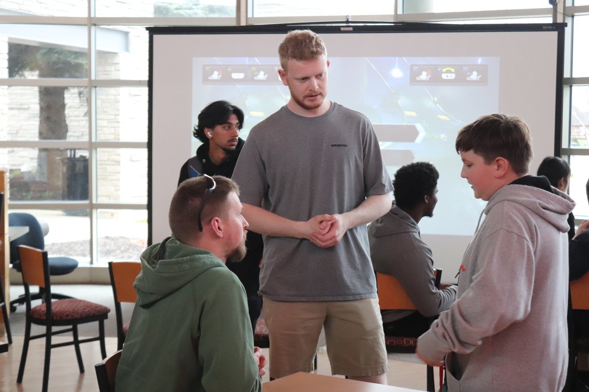 marian_wi's tweet photo. College is so cool! Especially at @marian_wi! Local high school and middle school students had fun interacting with Marian students and Marian #eSports Coach Trace Rutman at the "eSports and Recruitment Event," held in the Common Grounds Coffee House on campus. #funcampus https://t.co/4MGiGXJT4b