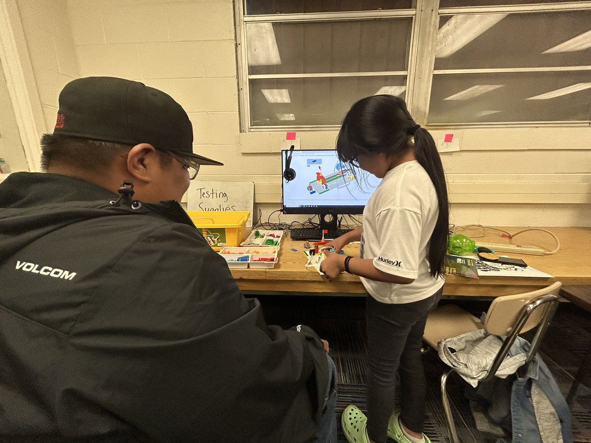 LEGO spike- showing dad how it works and how to program it. STEAM and easing night was a hit. <a href="/ABQschools/">Albuquerque Public Schools</a>