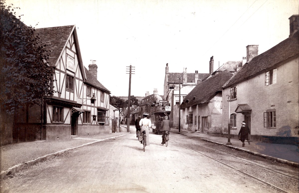 In this week's #WhereIsItWednesday we have this wonderful street scene of trams and bicycles.... but where in gods green Gloucestershire are they? #localhistory #Gloucestershire