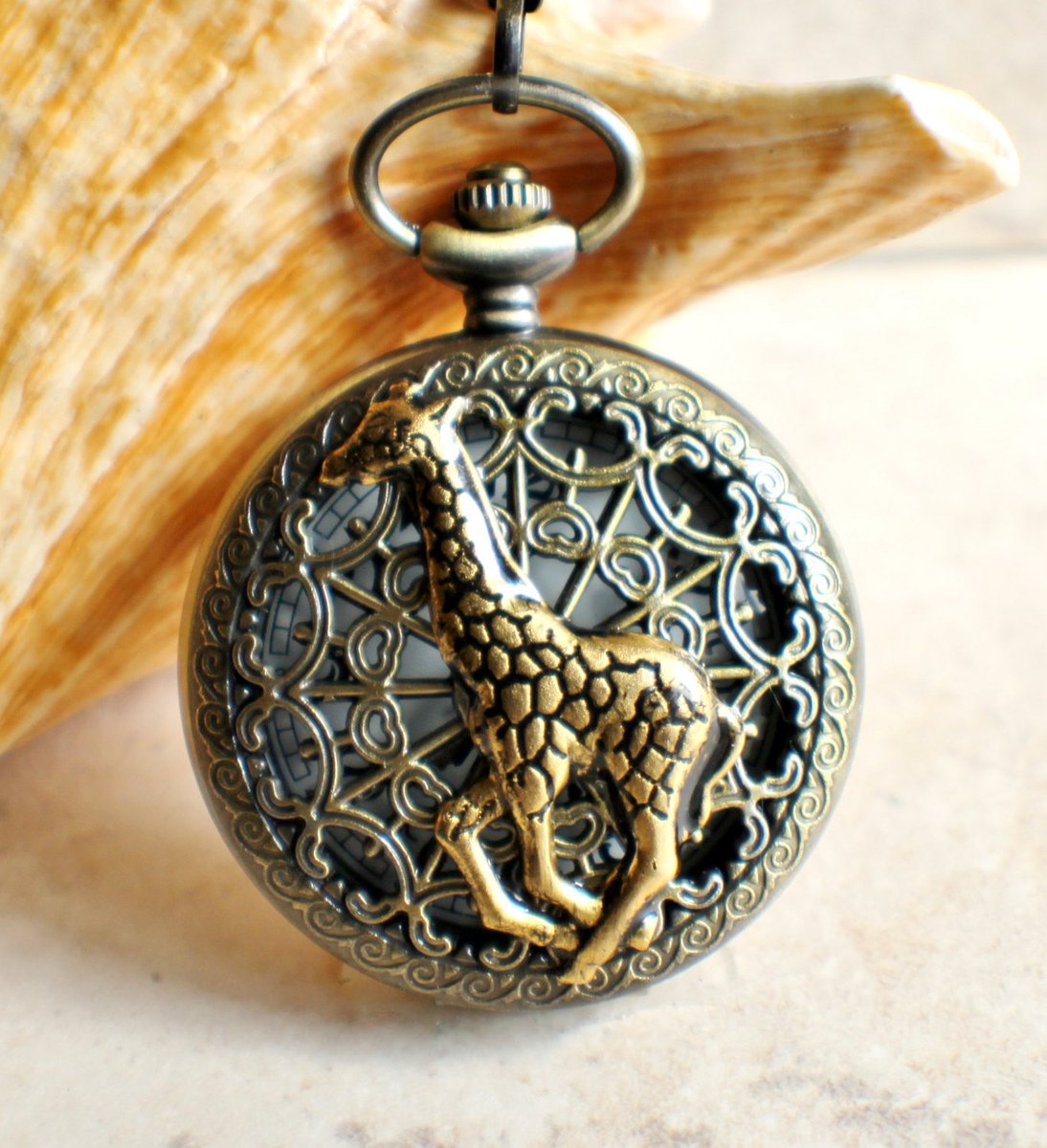 Giraffe battery operated pocket watch in bronze. tuppu.net/eccde7ae #Shopify #Char'sFavoriteThings #MensGiraffeJewelry