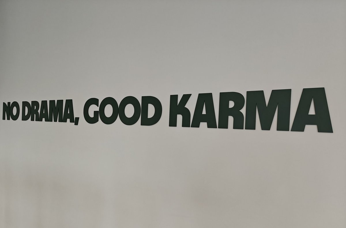 My work life motto on the wall of @Wise Singapore 🇸🇬 office #nodramagoodkarma 🫶🫶🫶