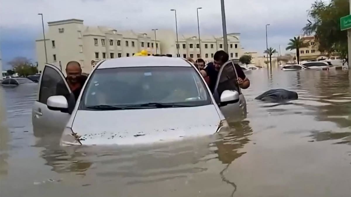 Dubai reels from floods chaos after record rains todayonline.com/world/dubai-re…