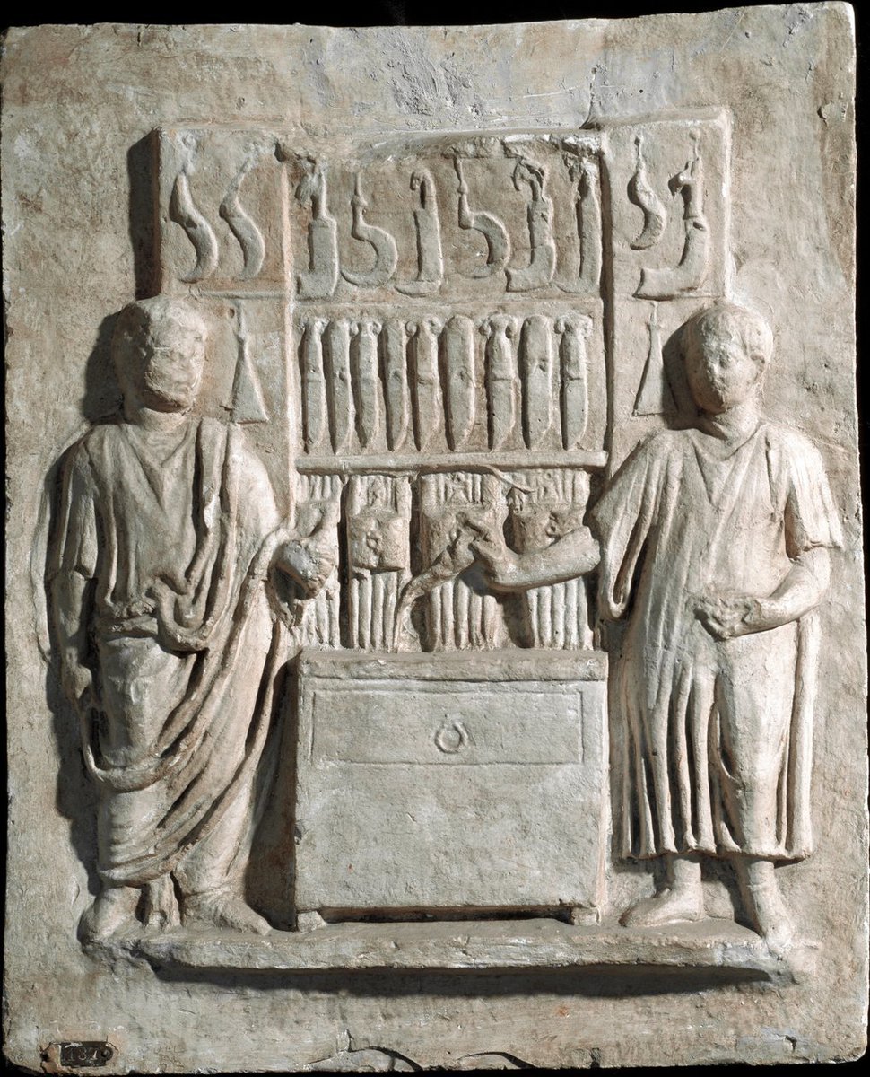 #ReliefWednesday - A relief panel from the altar-ossuary of Lucius Cornelius Atimetus and his freedman, Epaphra: ca. 2nd Century AD. The panel shows their shared trade as cutlers and knife-sellers. #Roman #Art 

Image: Musei Vaticani (9277). Link - museivaticani.va/content/museiv…