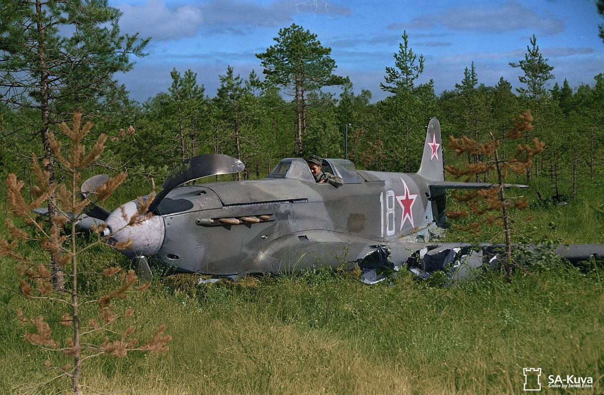 A Finnish soldier sits in a Soviet single seater Yak-9 fighter of the 29 Gv.IAP, 275 IAD, 13th Air Army, which crashed landed near Lappeenranta in Finland on August 30 1944 (photo taken on September 2 1944)