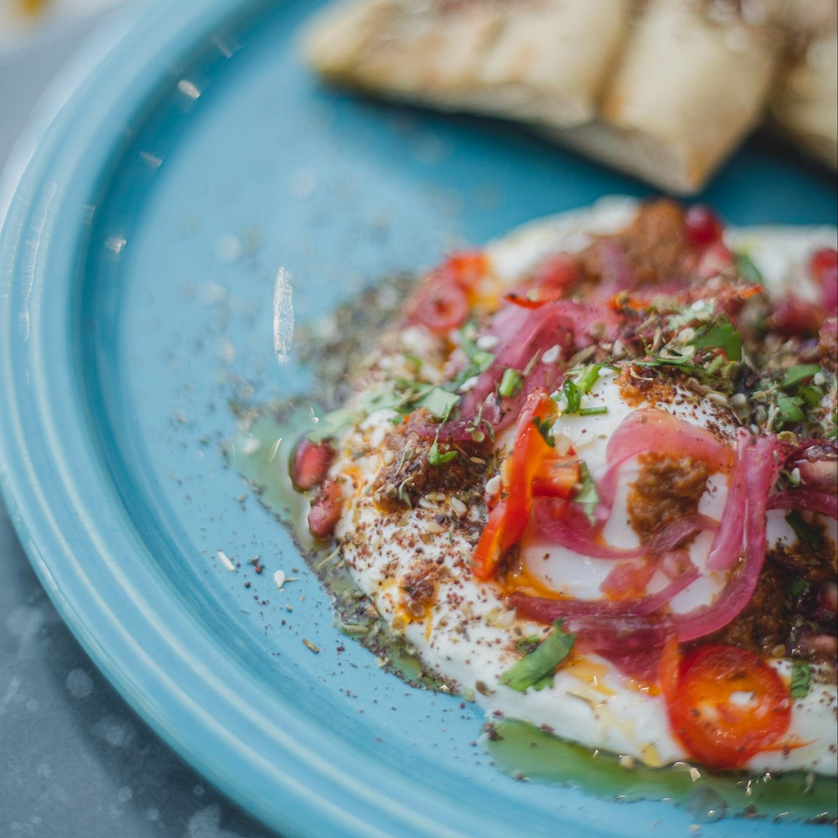 T H E L E B A N E S E 🍳 A CSONS classic featuring Labneh, poached eggs, our own harrisa, za'atar & flatbreads & finished with pickled red onions, chilli's, coriander & pomegranate Breakfast is served 7 days a week from 9 to 11.30 in Ludlow and Shrewsbury - Come and get it!
