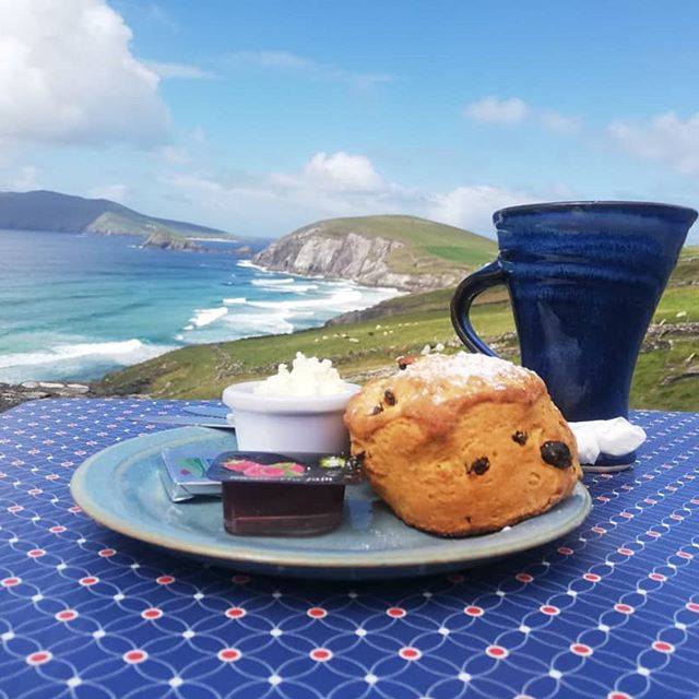 Freshly baked Irish scones on the #WildAtlanticWay with a view of the beautiful Slea Head - we can't think of a better way to start the morning! 📍 Caifé na Trá, Slea Head, County Kerry 📸 sibealnichathain on Instagram #FillYourHeartWithIreland