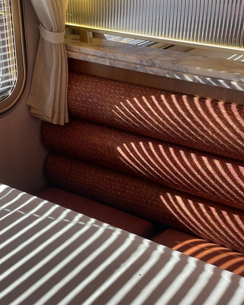 Woods Bagot-designed Gold Premium cars are officially rolling out onto Journey Beyond Rail trains, with the first carriages already onboard The Ghan. bit.ly/3UerKTW Photos courtesy of Journey Beyond. #woodsbagot #peoplearchitecture #transportdesign