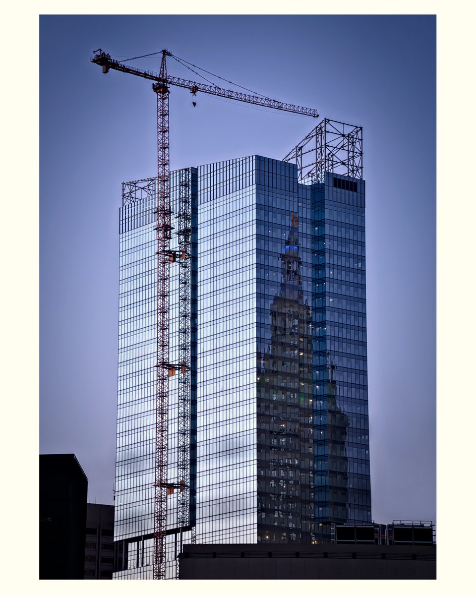 ProppedP's tweet image. A stunning reflection of the Terminal Tower on the new Sherwin Williams Global HQ as it nears completion. This old vs new display of architectural differences sure is impressive.