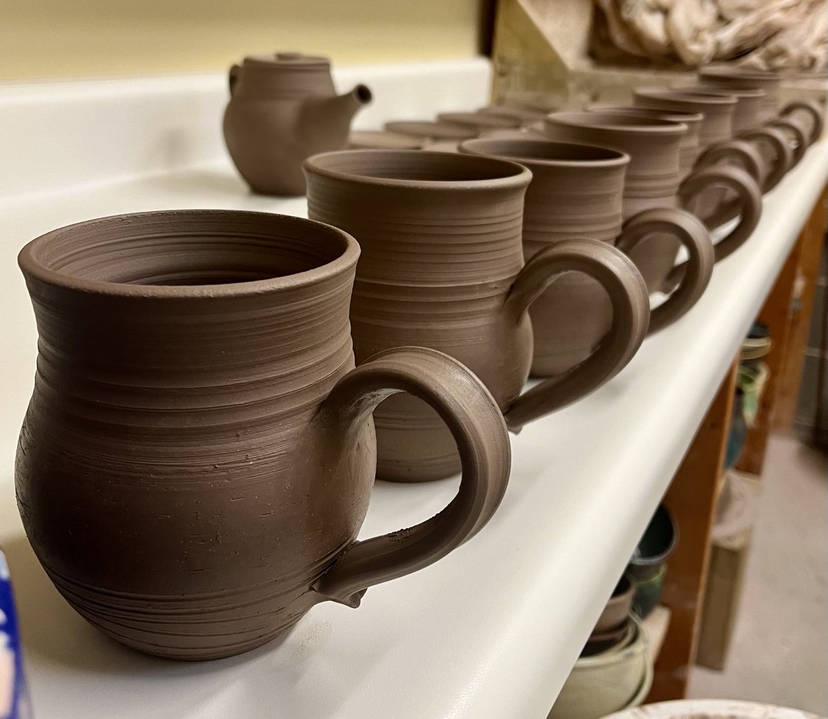 Making mugs in the studio this morning. Happy Wednesday, friends. #pottery☕️🤎