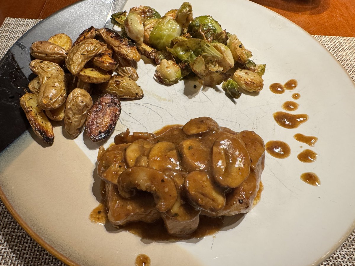 For dinner I made… pan cooked pork chops with a garlic mushroom sauce, roasted fingerling potatoes and brussel sprouts. :9