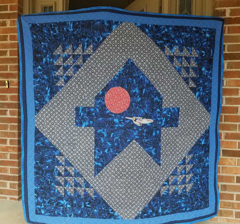 Star Trek quilts woven with love and passion brings warmth to our homes and reminds us that even in the vastness of space, the bonds we share are what truly matter.  #StarTrek #quilt #gift #textileart #handquilting
