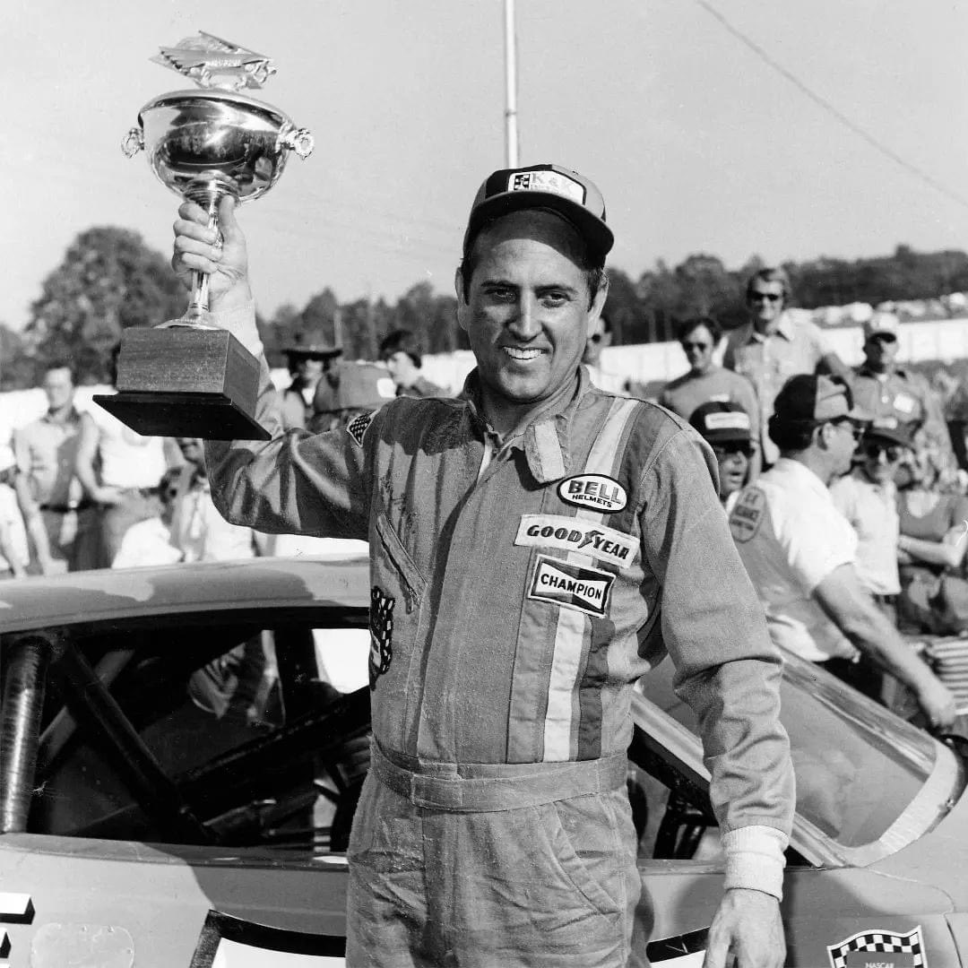 Dave Marcis with the Old Dominion 500 trophy in 1975 at Martinsville Speedway! It was his career's first NASCAR Cup Series victory 🏁  
 #nascar #vintagenascar #nascarthrowback #nascarracing #motorsports #nascaroldschool #nascarhistory