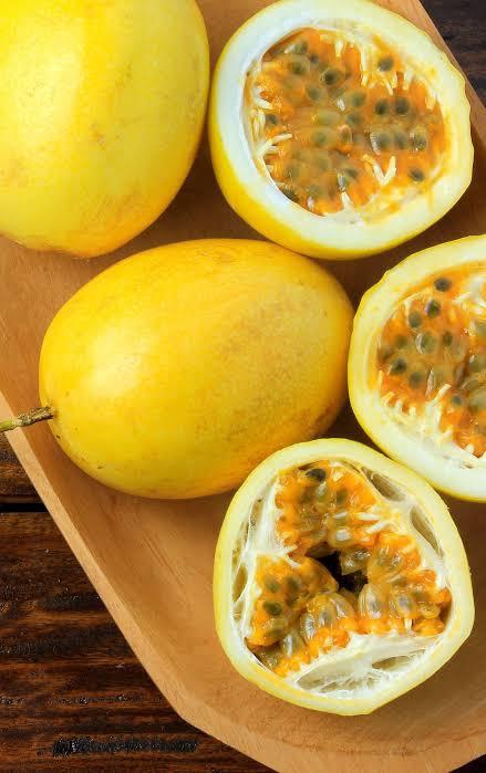 Giant Granadilla Passion The fruit is large, round, and has a tough skin that is green when immature and turns yellow when it ripens. The fruit is sweet, juicy, and has a distinctive flavor that is similar to that of other passion fruit varieties. The fruit is used to make