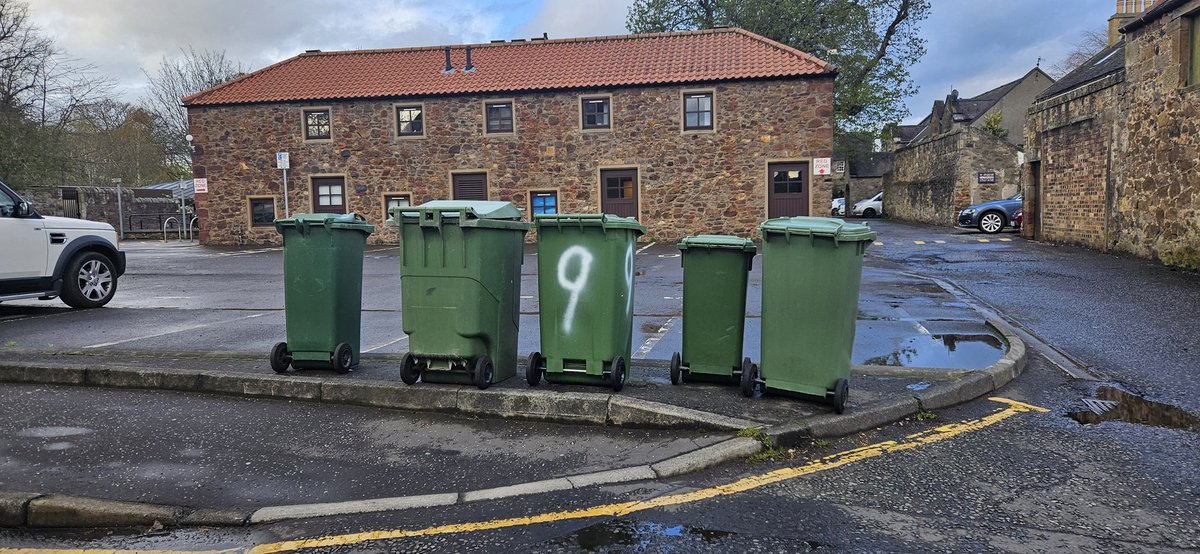 T33EWS's tweet photo. .@ELCouncil Tried to share this on Monday, bins have been sat out for a week and a half... 2 neighbours have requested this be sorted. Thanks https://t.co/BEdJqfzBeh