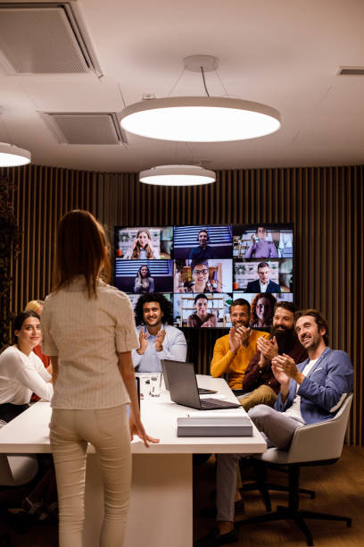 virtualinsider's tweet photo. Notice anything off in this photo? When I went remote in 2010, finding stock photos of hybrid teams was tough. Now they're common, but often miss the mark. What would you adjust about how #hybridmeetings are shown here? #virtualleadership #hybridwork https://t.co/uMKcJFEKeA