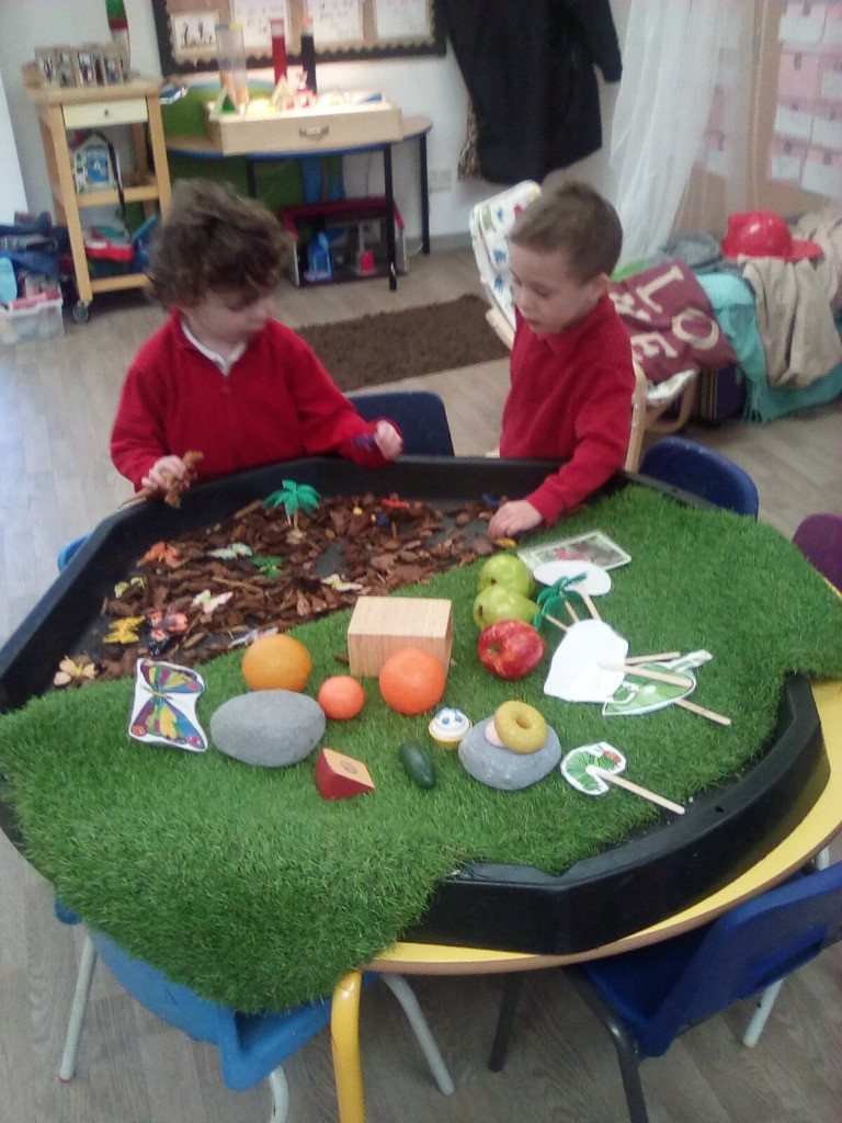 Accprimary's tweet photo. The children in preschool @Accprimary have enjoyed investigating The hungry caterpillar tough spot- retelling the story and creating the characters out of dough. #creativity #storytime #retellingstories #toughspots https://t.co/T3E4JzsZoJ