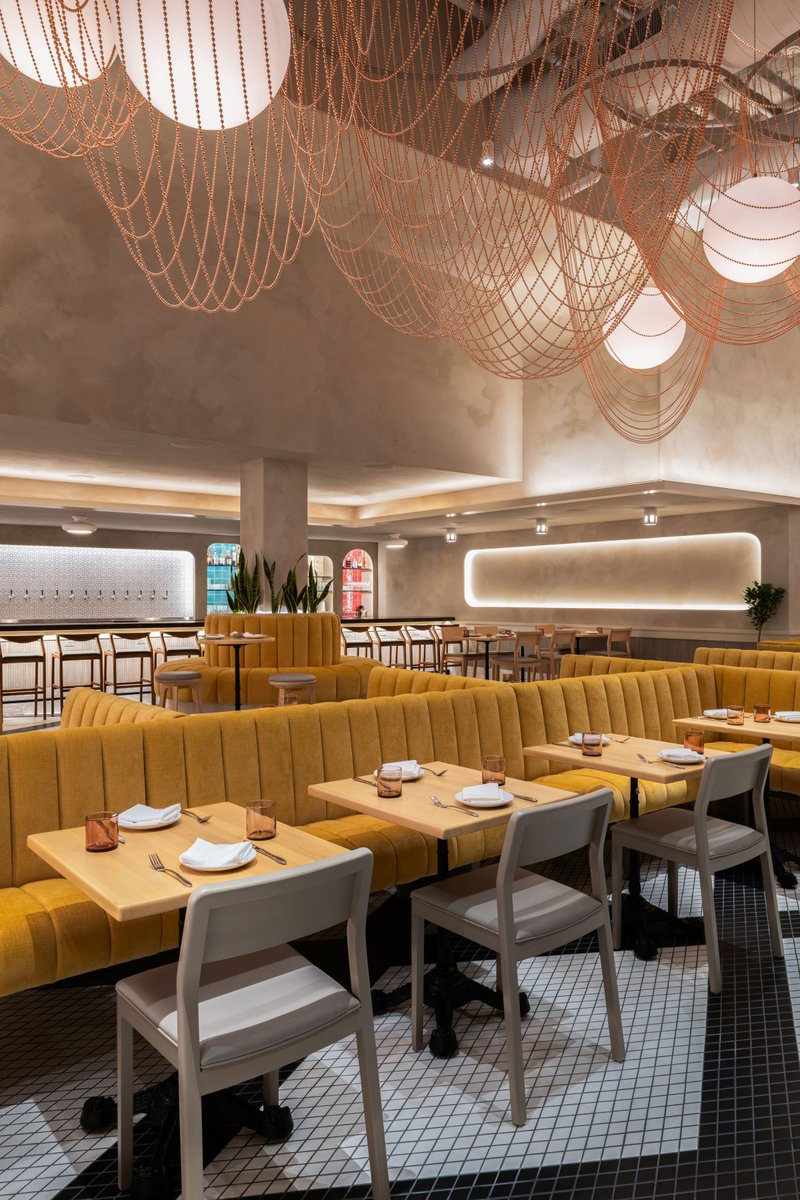 Can we talk about some of these details at RODE-designed Baleia? Colorful tile, arched openings, knotted rope, and textured walls pair with a bold lighting installation featuring a copper chain 'net.'
#HospitalityDesign #RestaurantDesign 
📷 Sabine Nordberg
🏗️ JJ Welch