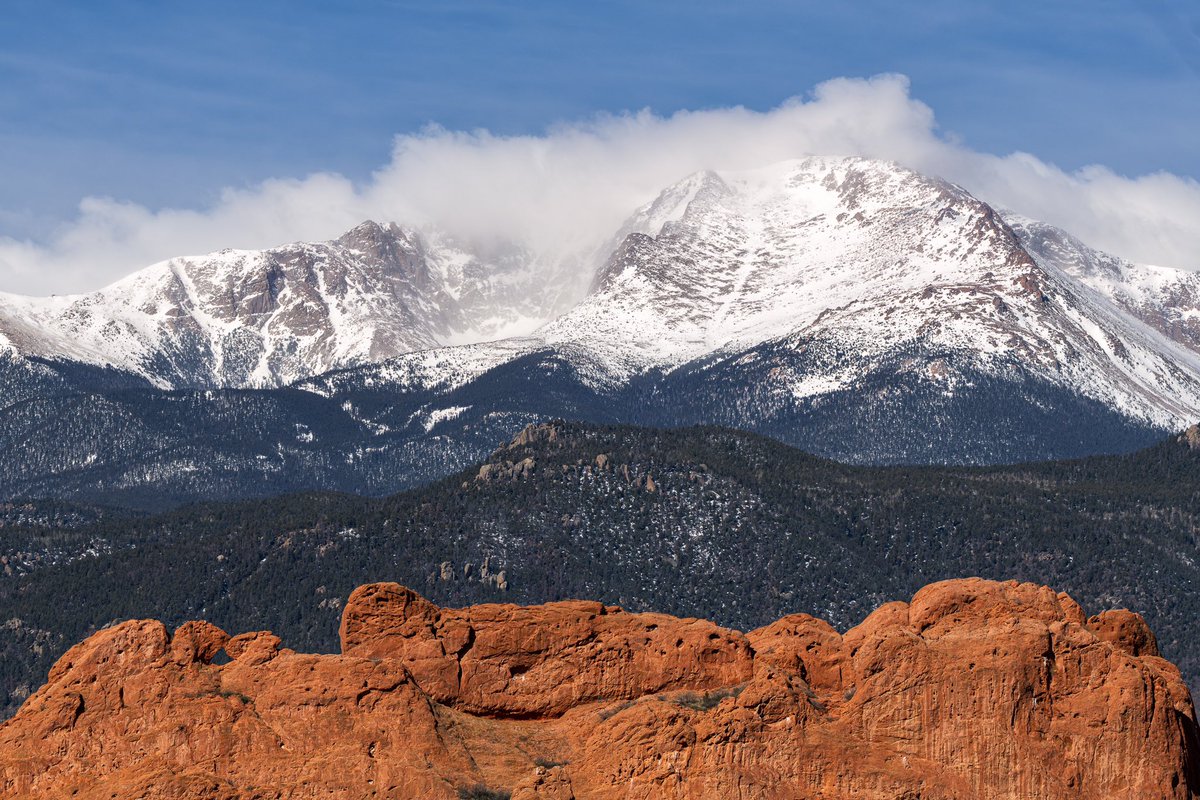 A snow covered Pikes Peak over Kissing Camels. #Colorado #stormhour #cowx #photography