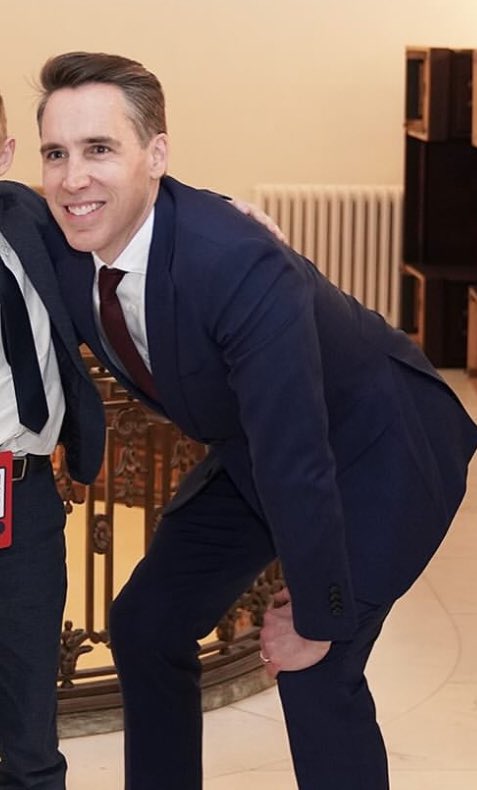 What yoga pose is Josh Hawley doing?