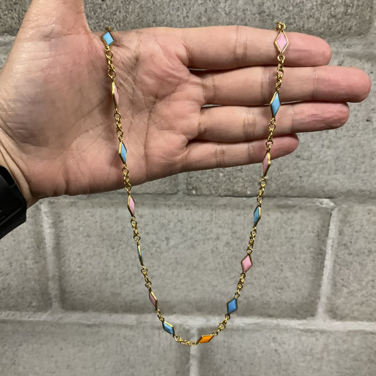 Available now! 18k gold necklace featuring pink, blue, and orange inlay stones! 20.5 inches long and weighs 18.2 grams. Take this beauty home for only $1999.99 but mention this post and take 20% off!   #pawnshop #oakland #bestcollateral #gold #goldnecklace #stonenecklace