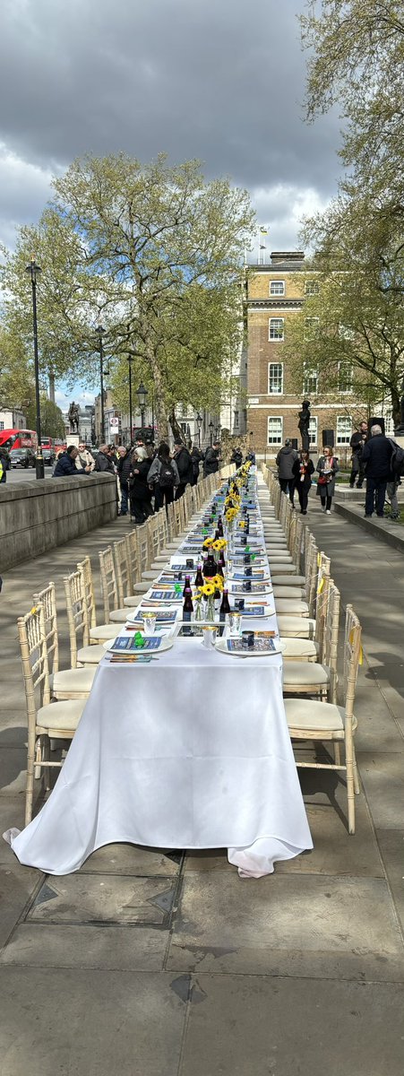 Table set outside Downing Street for the hostages. Incredibly poignant and powerful.