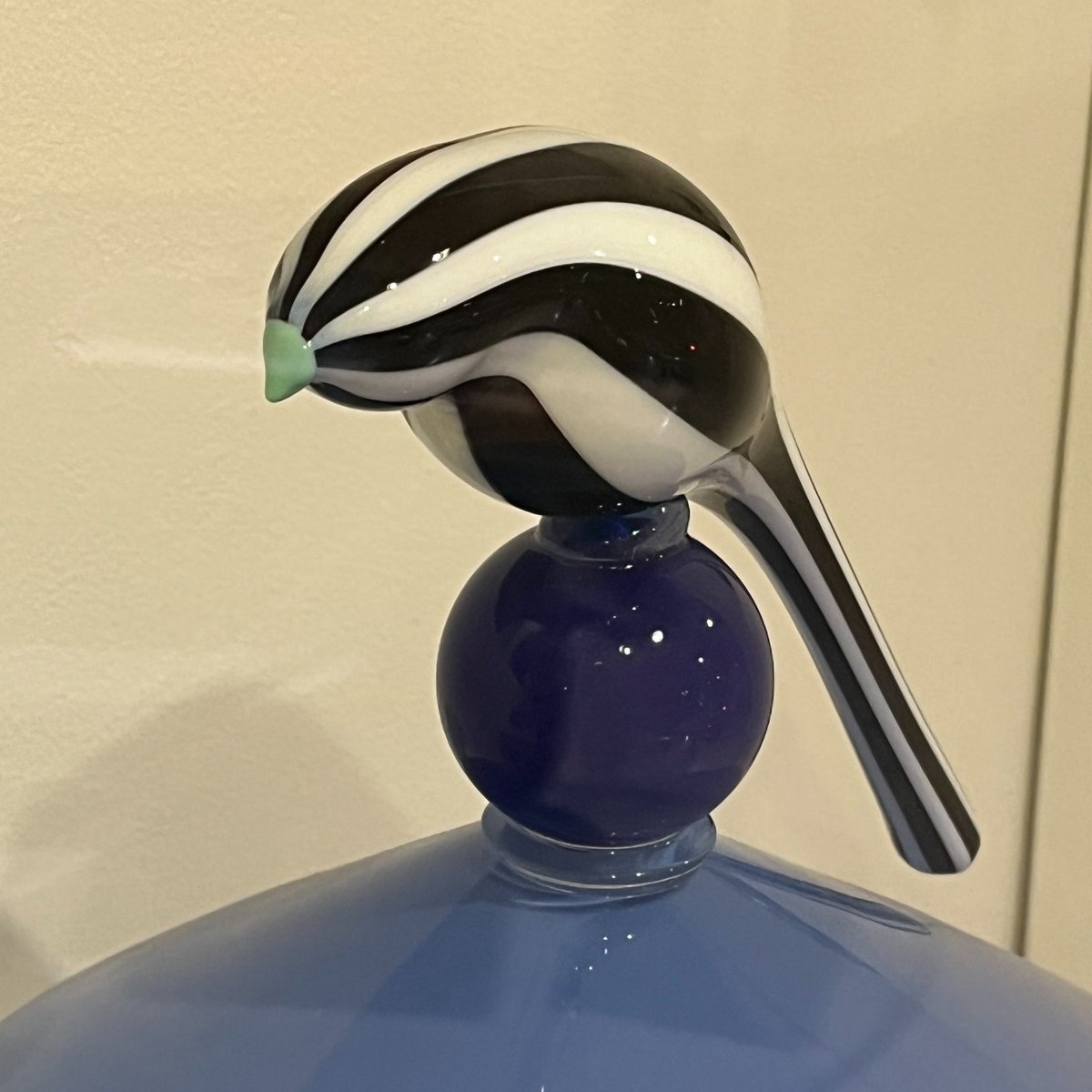 This week in Gallery Gems we have a piece titled 'Dutch Blue Bird Jar' by artist David Levi. This jar is made with handblown glass. Levi enjoys the expressive possibilities of the glass medium.

Find this piece in the Ceramics and Glass exhibit located in our Featured Niche Case!