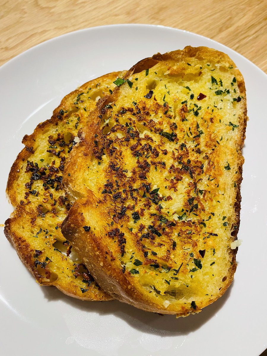 Sourdough garlic bread: Mix: -Butter, softened -Lots of garlic -Fresh parsley -Grated parmesan -A drizzle of olive oil -Pinch of salt -Crushed red pepper (optional) Spread on bread and toast on a pan or broil in the oven until golden