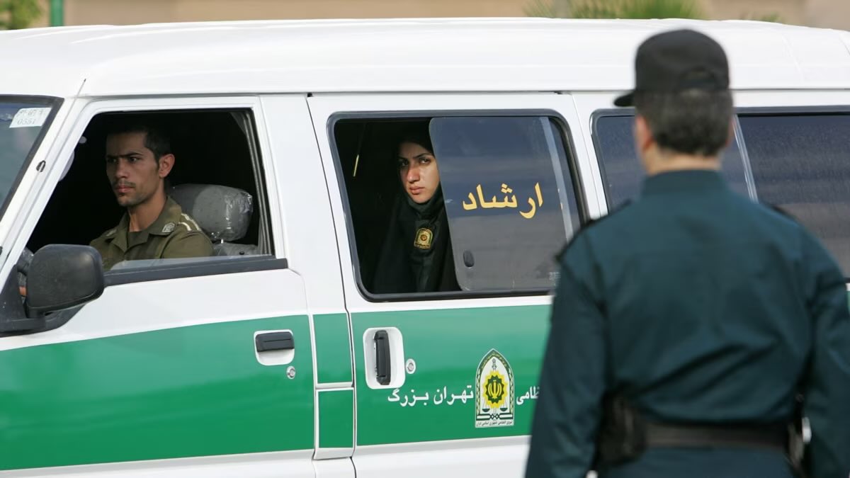 The Islamic Republic of Iran’s so-called morality police in one of their notorious vans which are used to haul women (and some men) to correctional/reeducation centers. The vans usually have two male officers and women officers who wear the chador (the black cloak the most