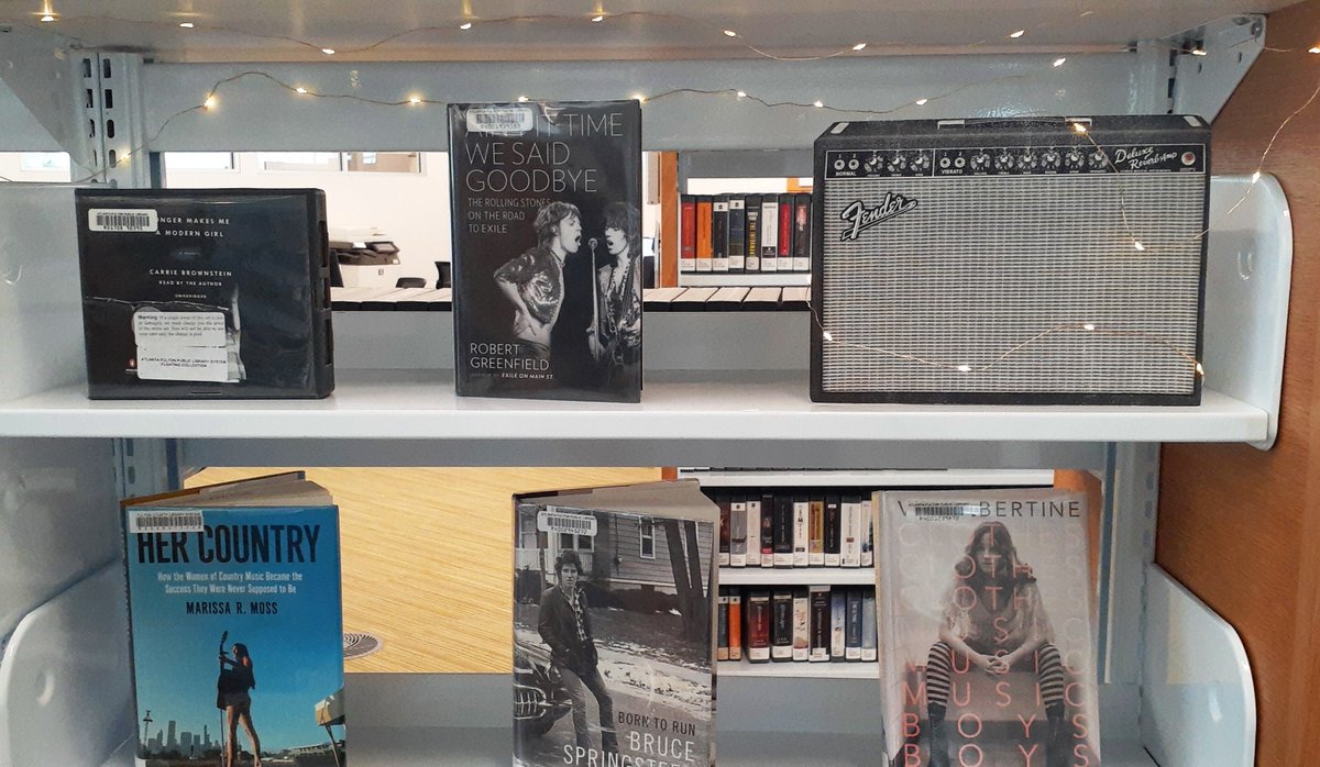 Celebrate National Gardening and International Guitar Month at Metropolitan! Enjoy our beautiful displays of nature and music! #fulcolibrary #bookdisplay #metropolitan #nationalgardeningmonth #internationalguitarmonth