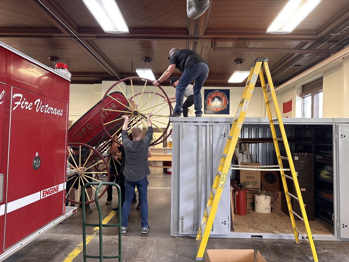With the impending renovations coming up at our beloved Station 2, it was time to start stashing away some of our treasures. Most of what we had on display got nicely tucked away in our storage unit. But hmmm, where to store our antique UPC Hose Cart.