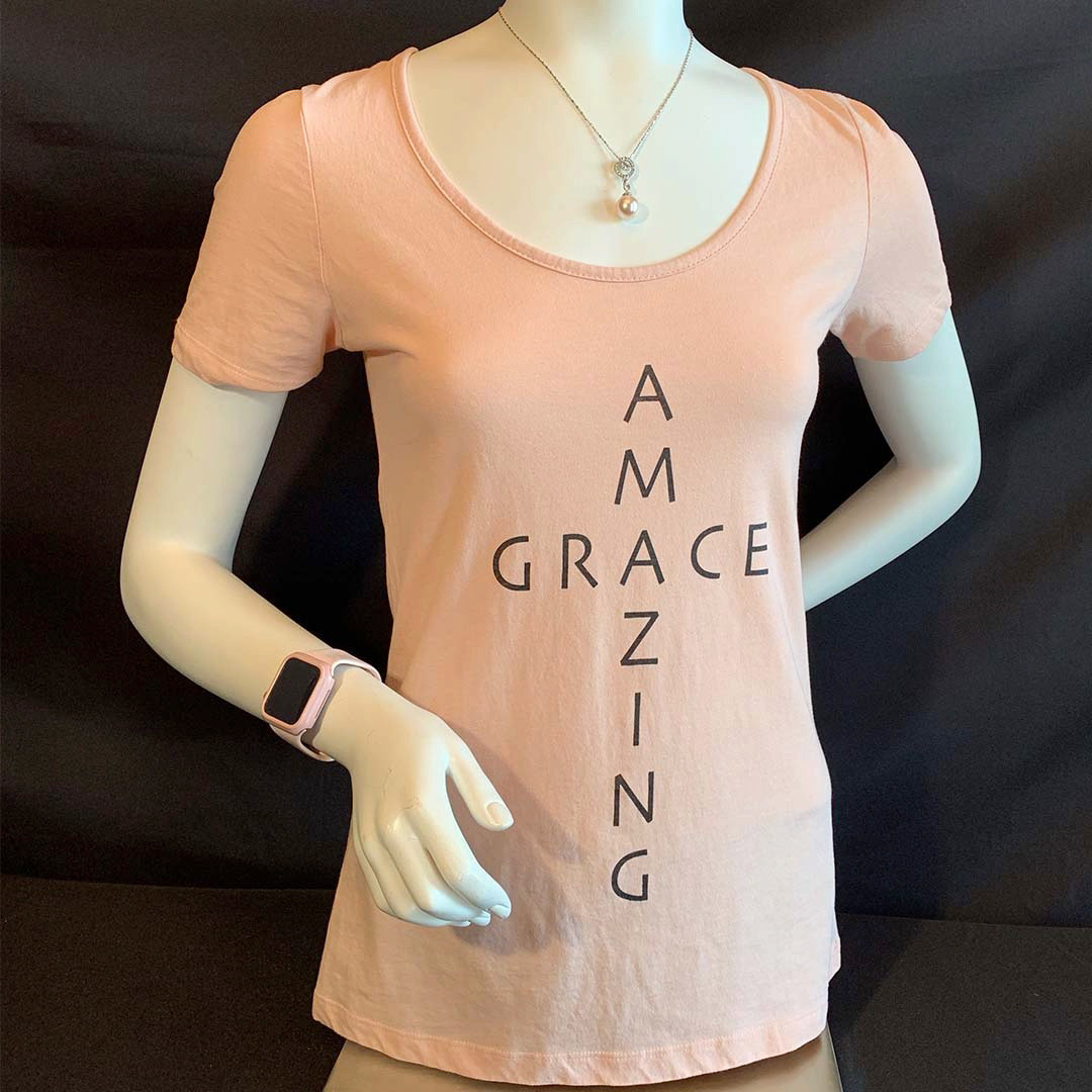 God’s amazing grace was demonstrated with Jesus Christ on the cross and this shirt proclaims that truth. They are slightly contoured for a more feminine fit and available in sizes S-XXL. #JesusSaves #GiftIdeas #AmazingGrace #GodIsGood shinealightpress.com/product/amazin…