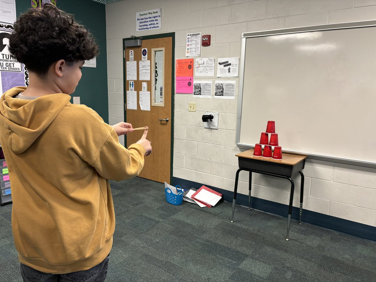 ladonnaschwab's tweet photo. Ms. Grady’s class at Ted Polk Middle School having a good time with the review today. When the group gets an answer correct they get to shoot a rubber band at stacked cups. @kara_miller3 @garveyt1 #pantherspersevere #wearecfbmath https://t.co/yzQuev6q6L