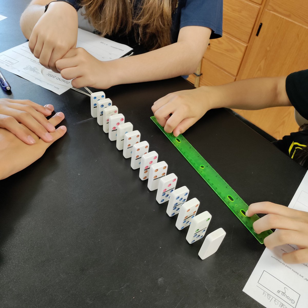 ms_vecchio1027's tweet photo. "Domino Dash"! How fast are the Dominoes falling? Measuring, calculating average speed, designing shapes and just having fun. https://t.co/KmOCi53gi3
