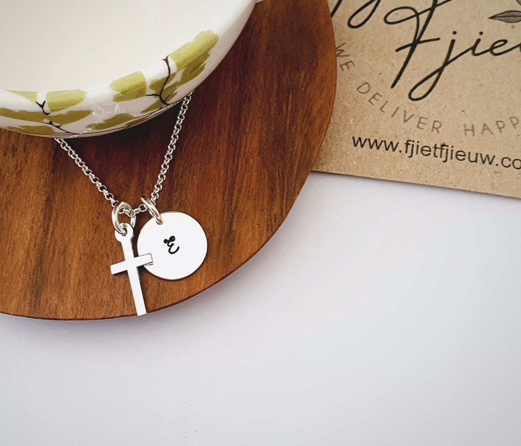 Argentium Silver Cross and Sterling Silver Initial Pendant and Chain! 

#argentiumsilver #lasercut #cross #crossnecklace #crosspendant #steringsilver #handstamped #handpierced #rounddisc #discnecklace #discpendant #personalised #initial #chain #fjietfjieuw #wedeliverhappiness