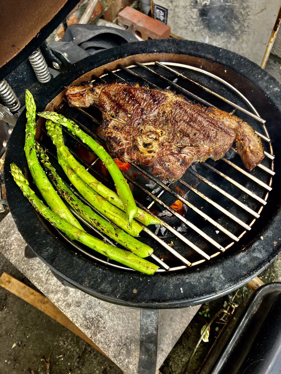 Superb Barnsley Chop from The Ploughman's Farm Shop on the mini Kamado bbq, Served with asparagus from the same shop and creamy mustard mash. A little chopped spring onion over the top. #barnsleychop #lambchops #mustardmash #minikamado #bbqlife