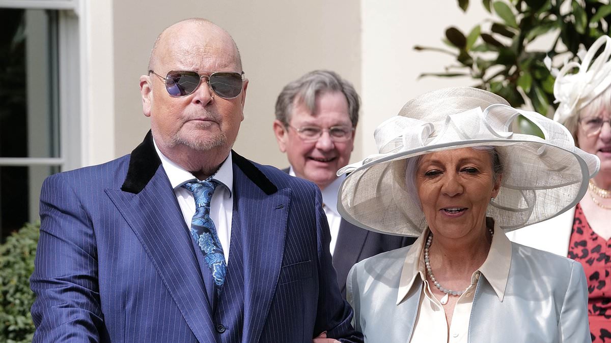 James Whale looks smart as he heads to Windsor Castle to receive his MBE with his wife Nadine by his side - amid his terminal kidney cancer trib.al/JRXuJtK