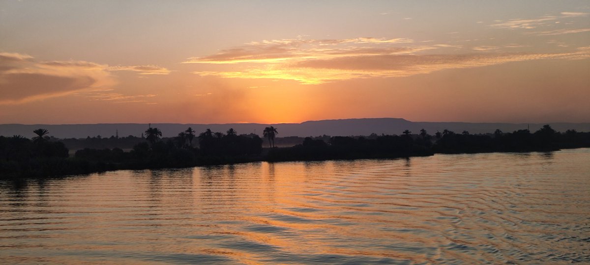 I have now left Luxor and am continuing my journey in Egypt aboard a cruise boat to Aswan. This was the serene sunset on the River Nile this evening 😊 #travel #cruise #sunsets