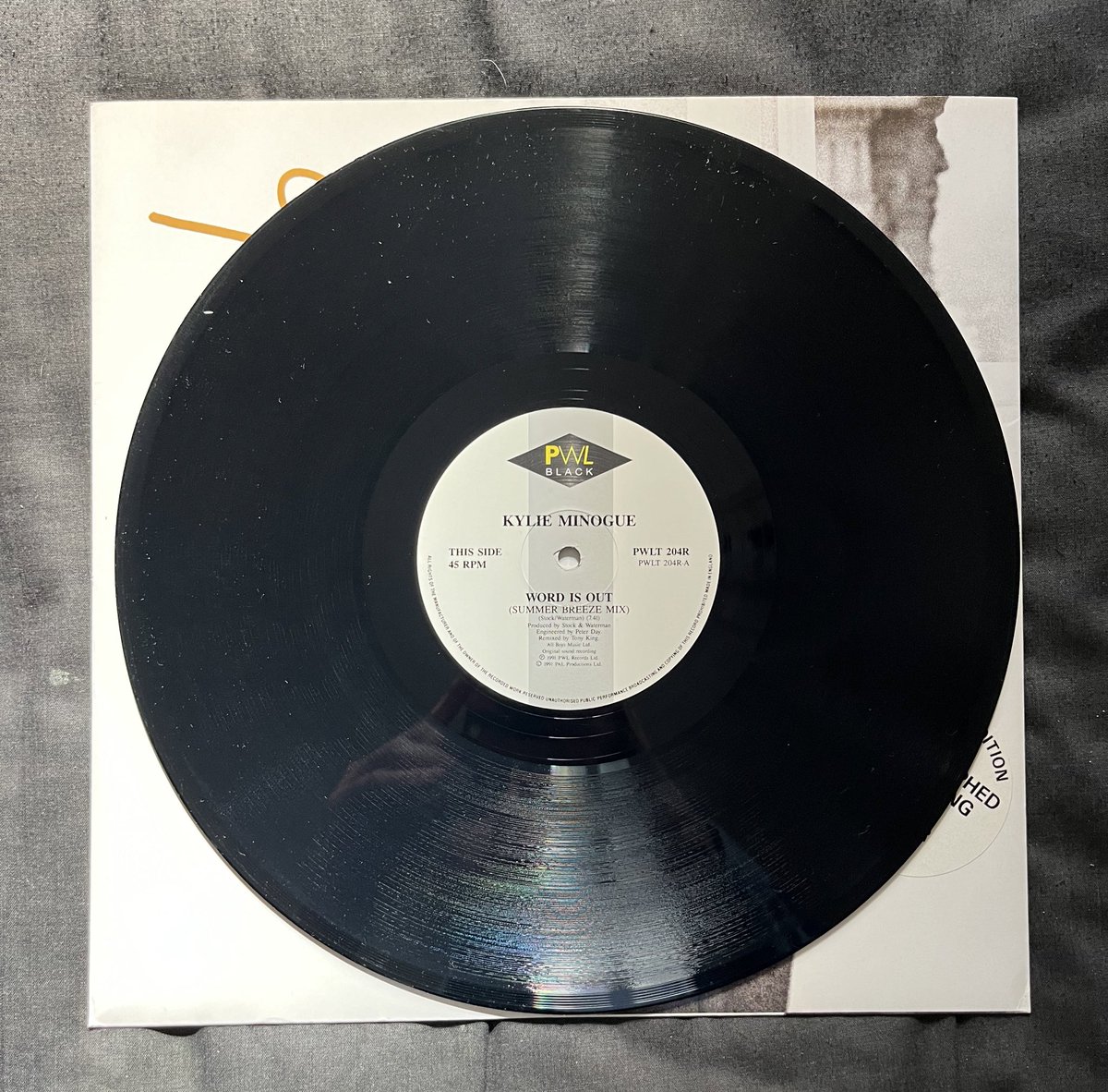 MichaelYoga79's tweet photo. Today’s delivery: Word Is Out summer breeze mix on single sided 12” vinyl with autographed etching in the back. @kylieminogue #kylieminogue #wordisout https://t.co/R4Dkf7oKWI