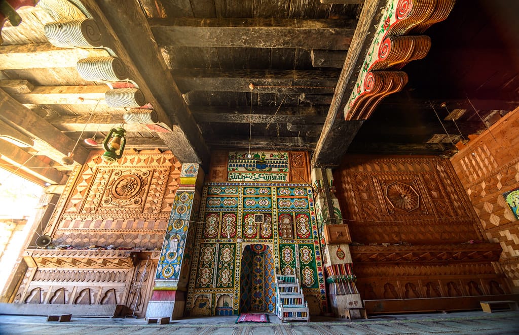 This mosque, built in 1865, is unique because it's entirely made of wood. It has large pillars and beams that were challenging to install. Thall kumrat upper Dir.