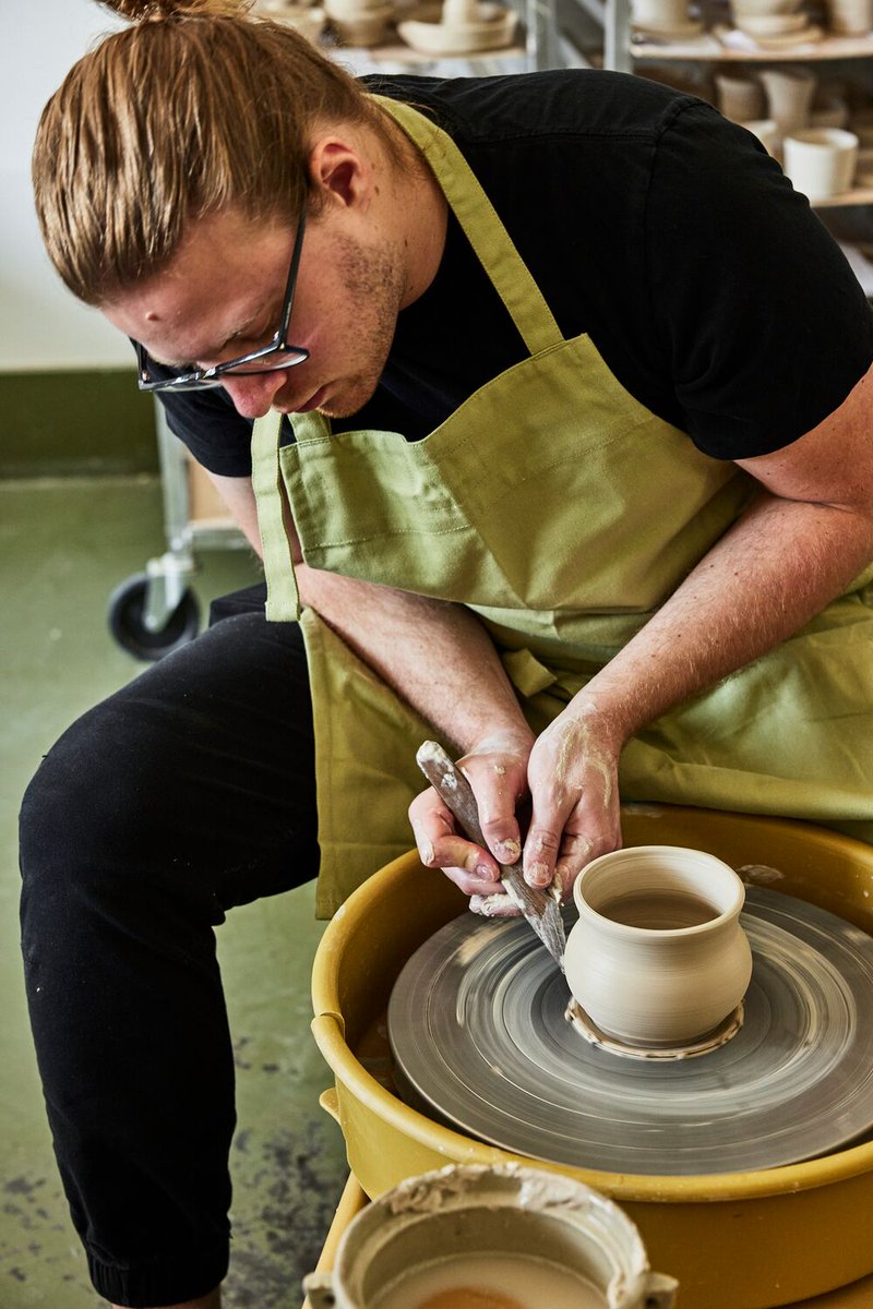 Wheel thrown pottery classes are not only a guest favorite, but a must-try experience! Let your imagination take shape on the wheel as you connect with the medium and hone your technique alongside our expert instructors. #BlackberryMountain #BMTN #WheelThrownPottery #Art