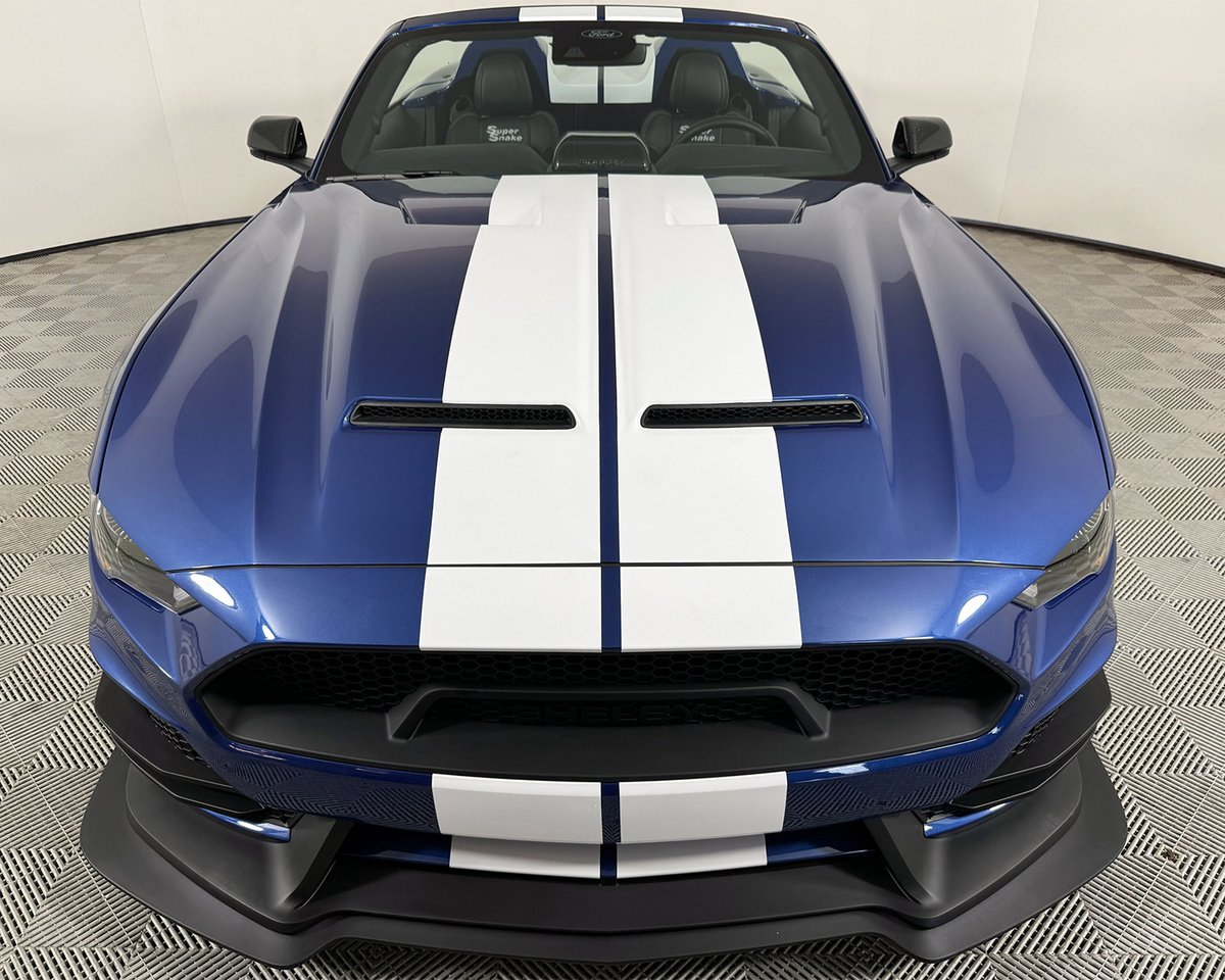 Barrett_Jackson's tweet image. Packing an impressive 825hp 5.0L #supercharged engine and 10-speed automatic, it's complete with a #Speedster convertible tonneau &amp;amp; Le Mans striping. With just 19 actual miles, this #SuperSnake is sure to create some excitement in the auction arena!

More: bit.ly/PB24TW-2023For…