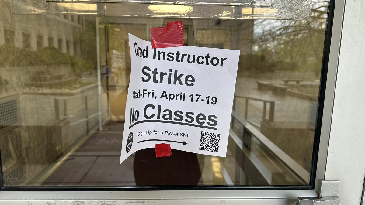 Signs posted on Ballantine Hall's doors, where the picket line is today @iustvnews