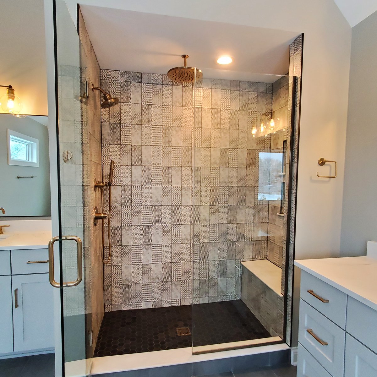 We love the unique geometric designs of these shower #walltiles! Our #modelhome is open from 11 am - 5 pm at 4012 Alfalfa Ln #Naperville #newhome #newhomedesign #newhomebuilder #newhomeconstruction #homebuilder #customhome #customhomebuilder #bathroomdesign #bathroominspo