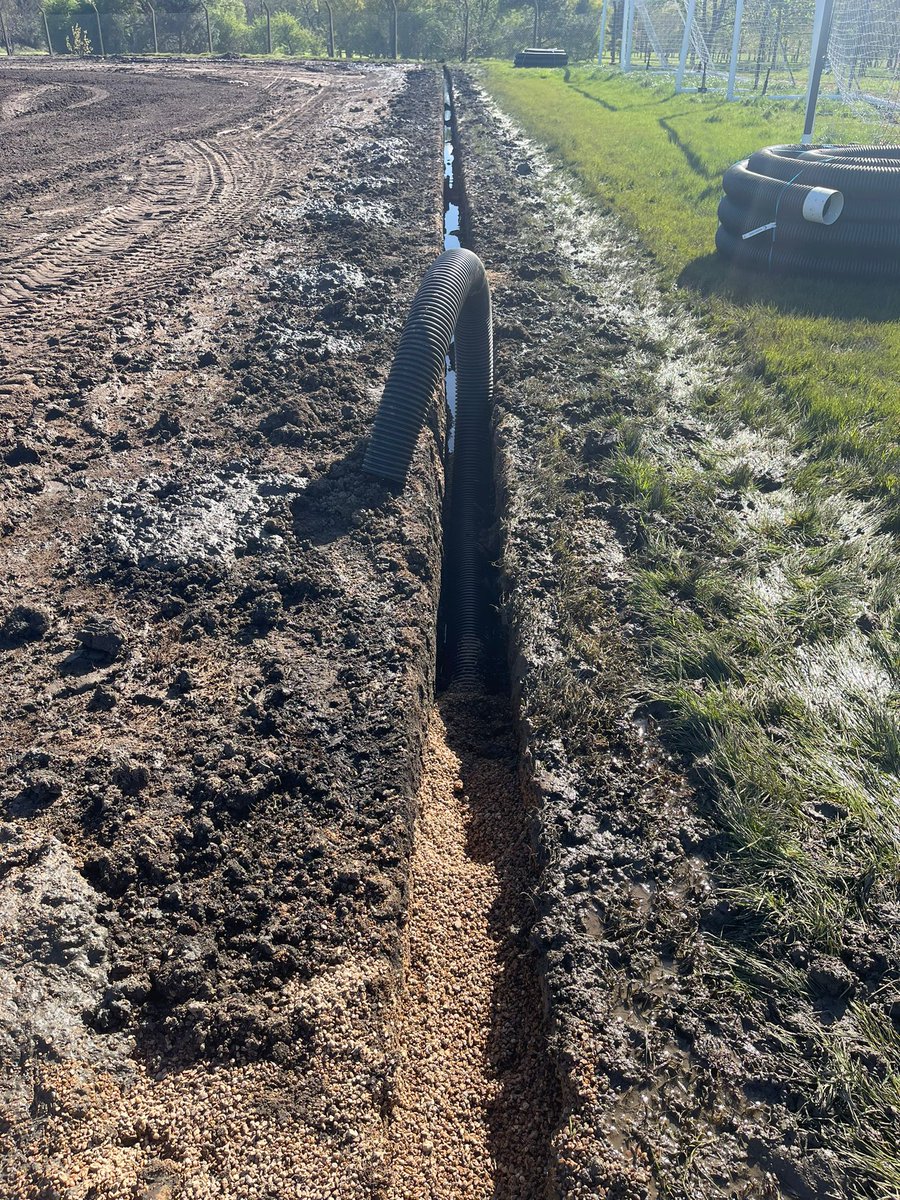 Day 9... busy day on and off the field! Levels are starting to take shape. Drainage trenches being cut in, pipe, and gravel back fill. #rufc