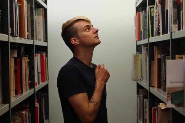 We're here!
We're Queer!
We're free and online!
Our poems don't have to rhyme!

Kicking off at 7pm, and with a few open mic spots available. Pictured - tonight's feature act deciding what to read