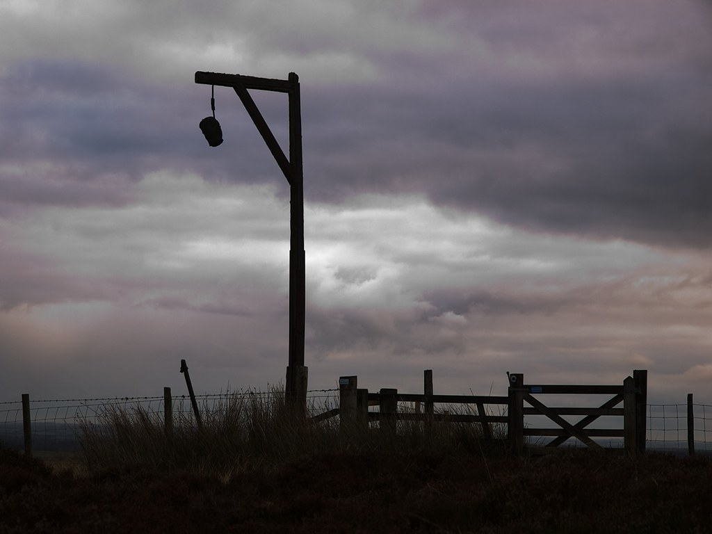 Winter's Gibbet, near Otterburn, Northumberland, suspended the corpse of the highwayman William Winter as a warning to others. Splinters from the gibbet are said to cure toothache. Winter's ghost can be seen on foggy nights, at a nearby cattle grid. #WyrdWednesday #folklore